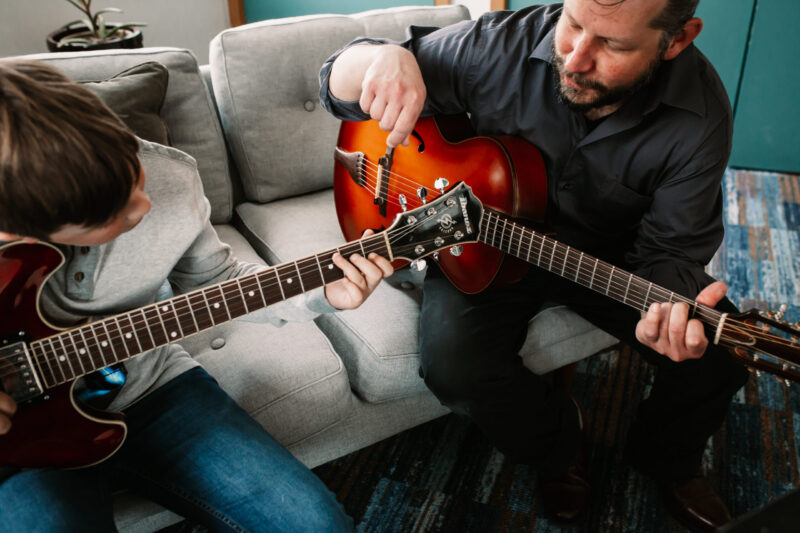 guitar teacher and student